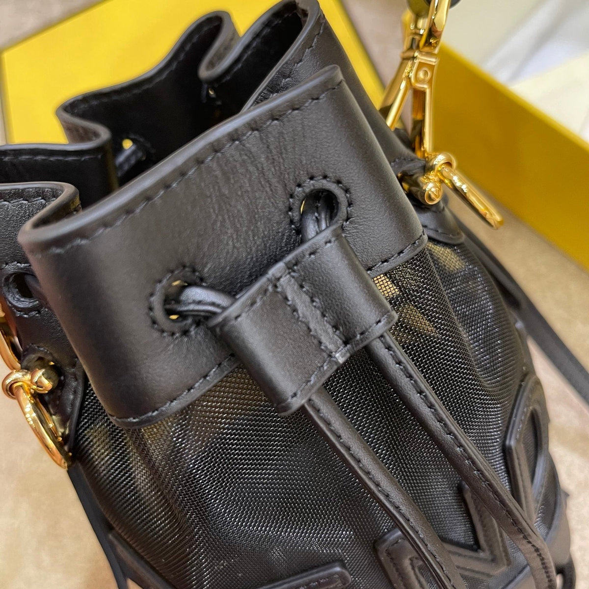 MON TRESOR 18 IN BLACK CALFSKIN AND MESH