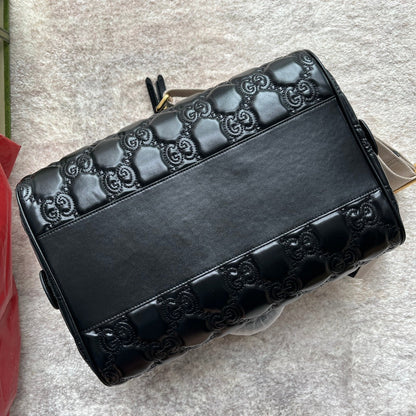 MATELASS¨¦ TOP HANDLE BAG 31 IN BLACK EMBOSSED CALFSKIN GOLD HARDWARE