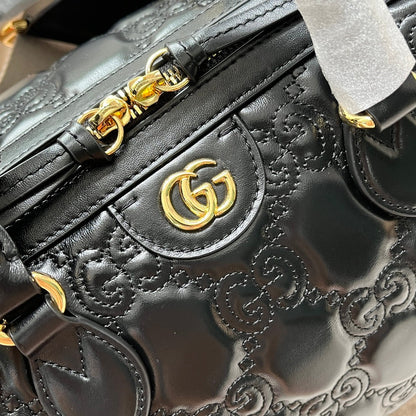 MATELASS¨¦ TOP HANDLE BAG 31 IN BLACK EMBOSSED CALFSKIN GOLD HARDWARE
