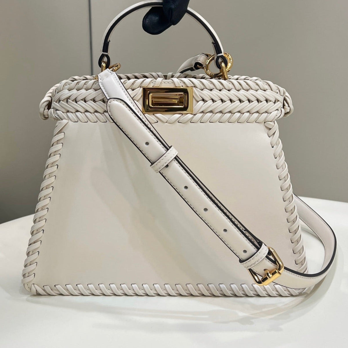 PEEKABOO ISEEU 27 IN WHITE SMOOTH CALFSKIN WITH WOVEN TRIM GOLD HARDWARE