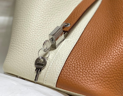 picotin lock 18 gold white togo shw