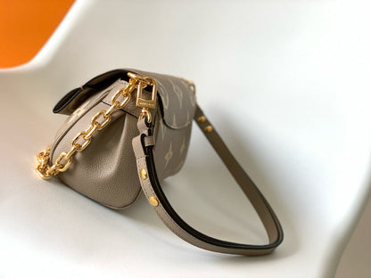 favorite 24 dove cream biocolor monogram empreinte leather