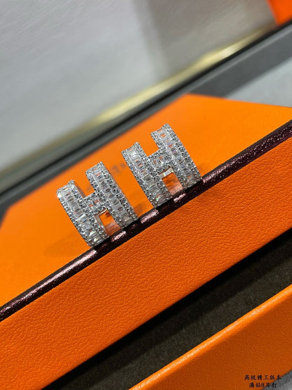 DIANA H STUD EARRINGS WITH SILVER DIAMONDS
