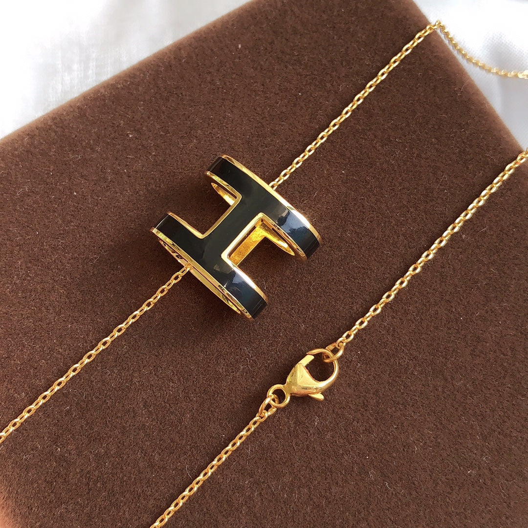 DIANA HM CLIC BLACK ENAMEL GOLD NECKLACE