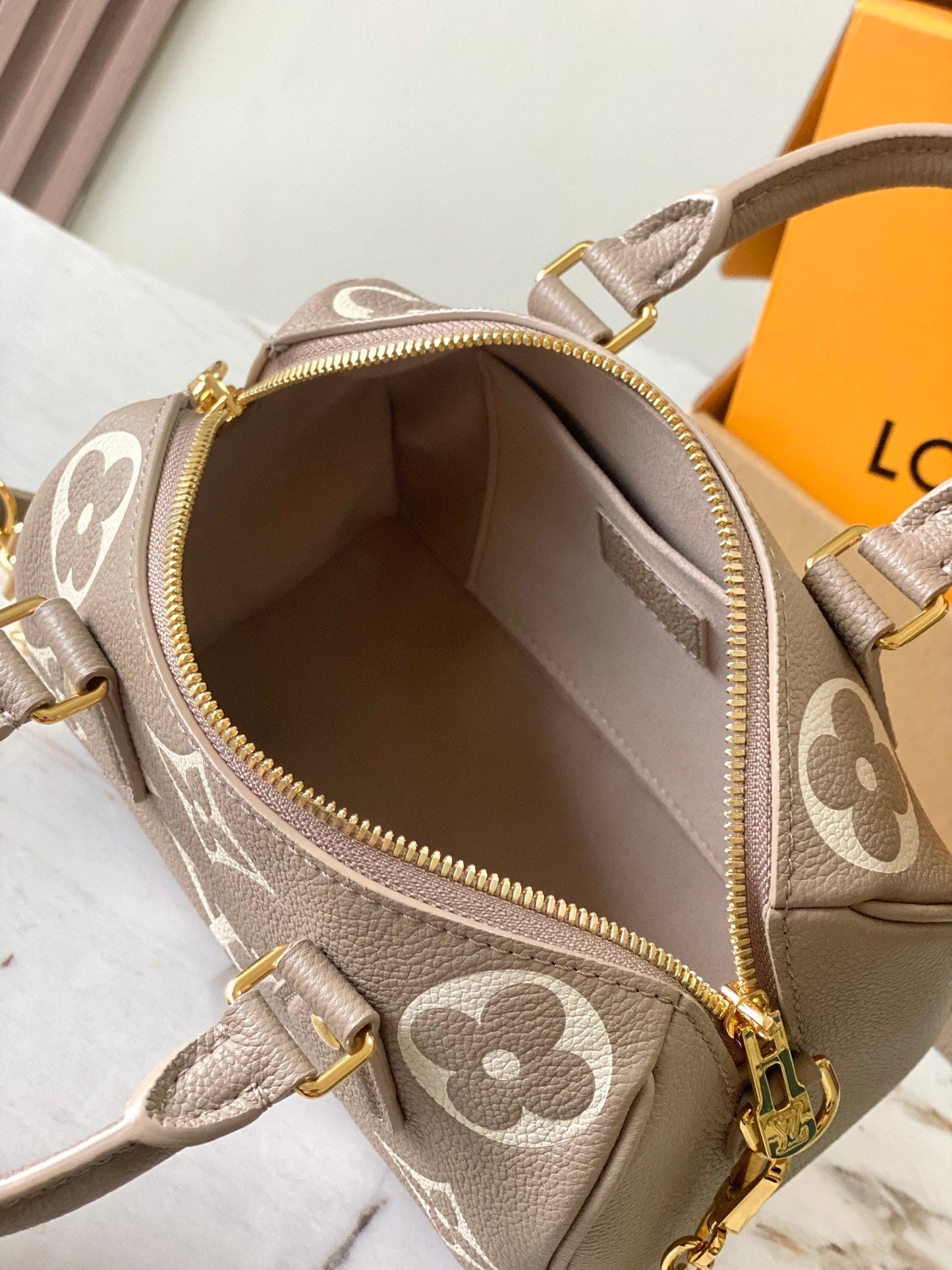 SPEEDY BANDOULI¨¨RE 20 IN TAUPE BROWN AND WHITE MONOGRAM EMPREINTE LEATHER