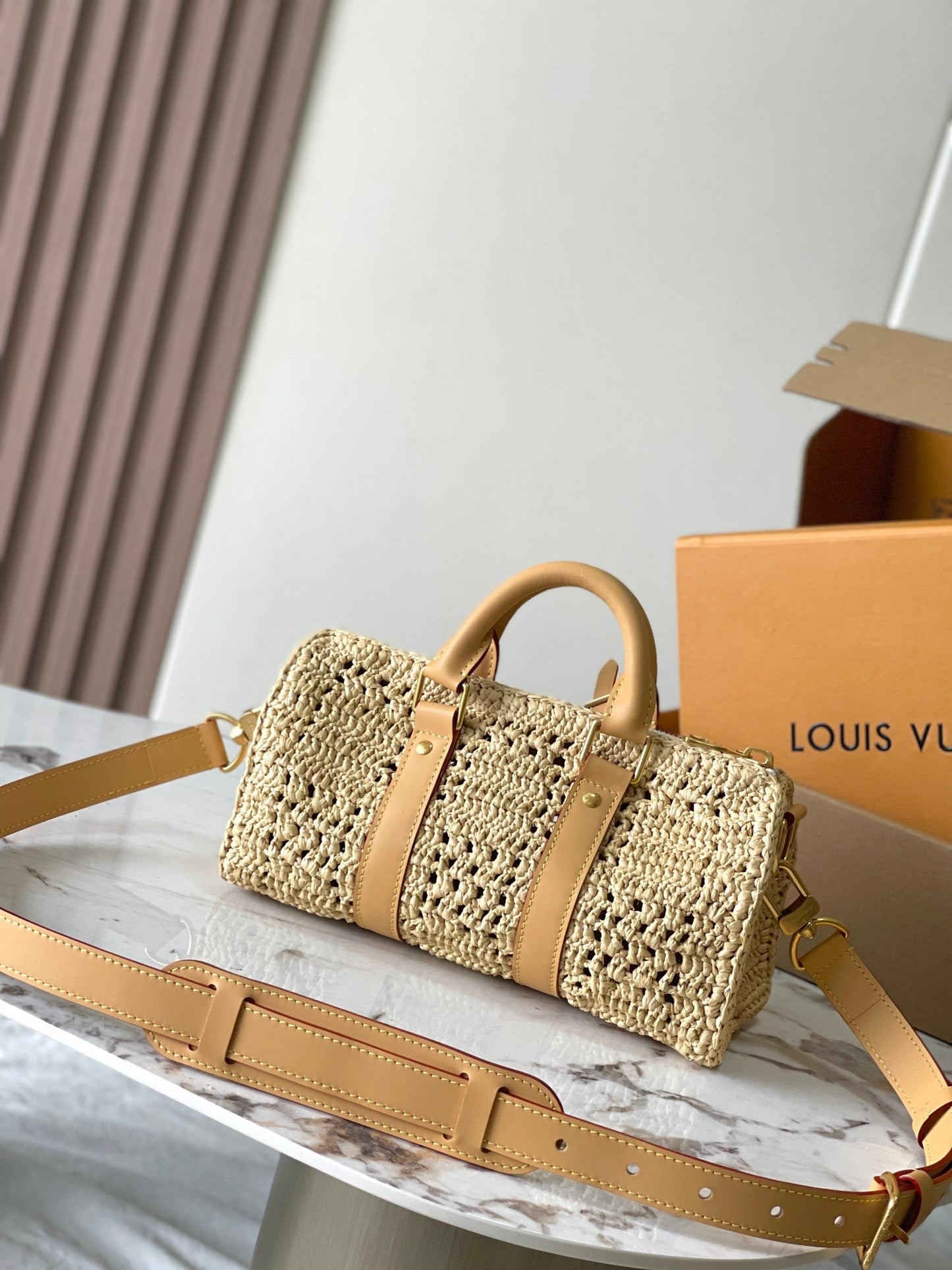 KEEPALL BANDOULI¨¨RE 25 IN BEIGE CROCHETED RAFFIA AND CALFSKIN TRIM