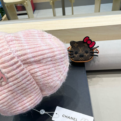 STRIPED KNITTED HAT IN LIGHT PINK WOOL 424515