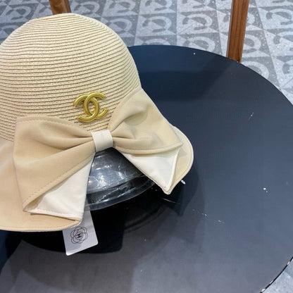 BOW BUCKET HAT IN EGG NOG BEIGE RAFFIA 426170
