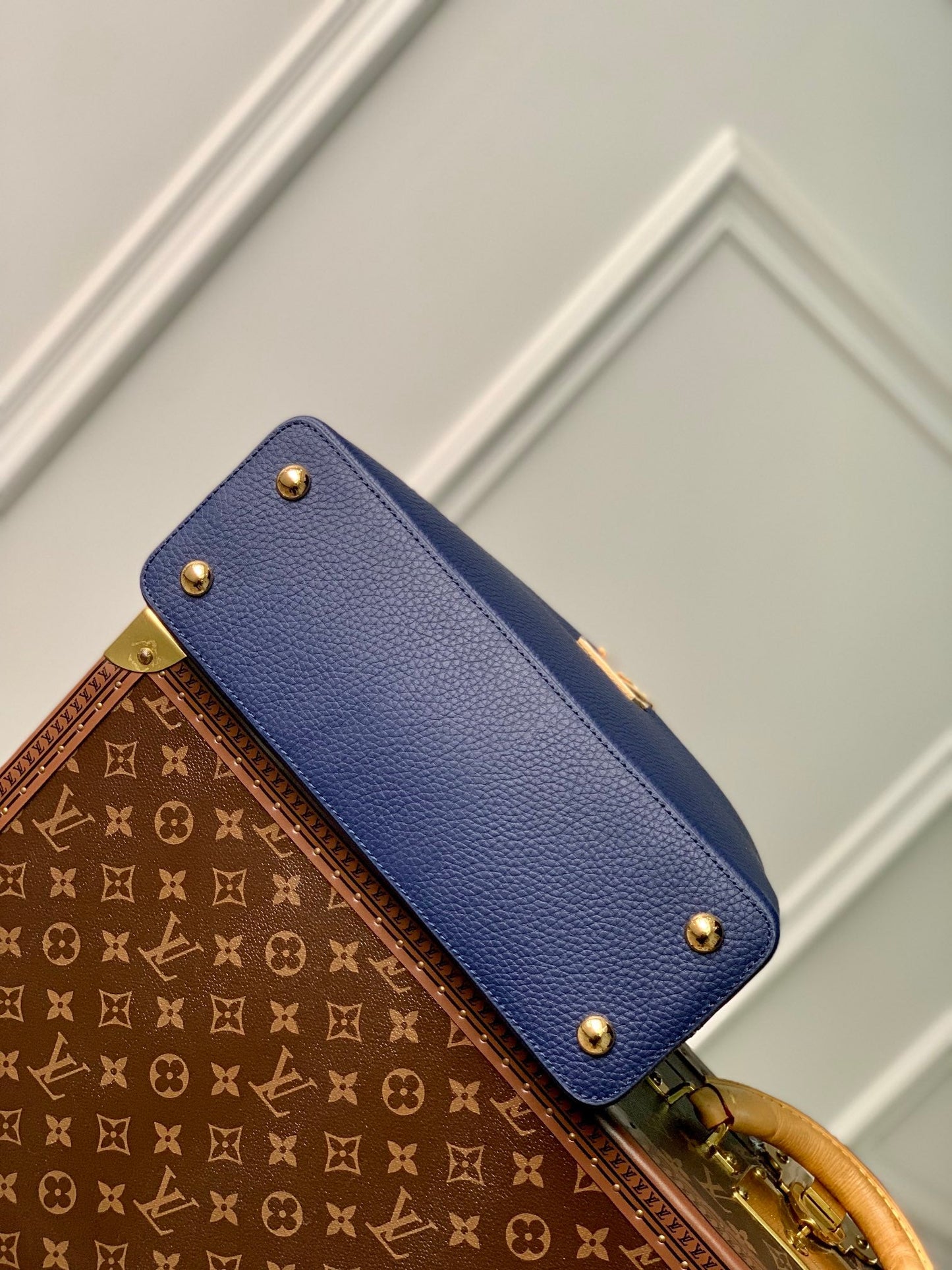 capucines mm 31.5 dark blue taurillon leather gold hardware