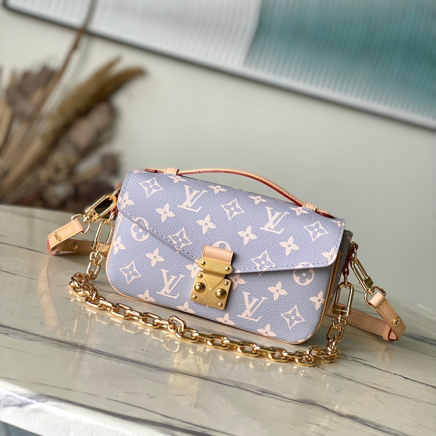 POCHETTE M¨¦TIS EAST WEST 21 IN GRAY CREAM MONOGRAM TRIANON CANVAS GOLD HARDWARE